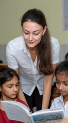Woman teacher guiding children in a knowledge-building activity, reading a story to enhance learning. 