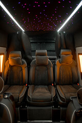 Comfortable interior of a passenger bus with soft seats