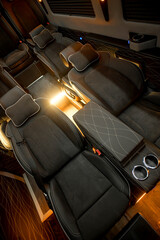 Comfortable interior of a passenger bus with soft seats