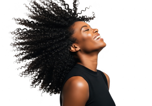 Joyful woman with long flowing hair smiling upwards against a black backdrop transparent background