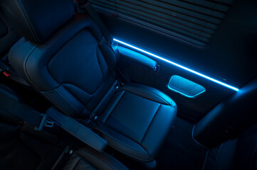 Comfortable interior of a passenger bus with soft seats