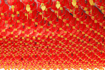 red Chinese lantern with the Chinese character Blessings in Chinese shrine.