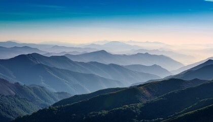 Obraz premium layered mountainscape in soft muted tones a serene and calming vista with a focus on depth and atmospheric perspective nature s gentle embrace