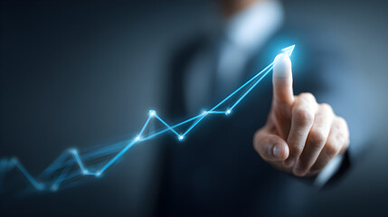 Businessman hand pushing business growth chart arrow