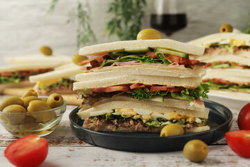 Different Italian tramezzini sandwich in tradition triangle form