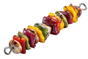 A single stainless steel skewer with grilled bell pepper, onion, and mushroom pieces, isolated on transparent background.
