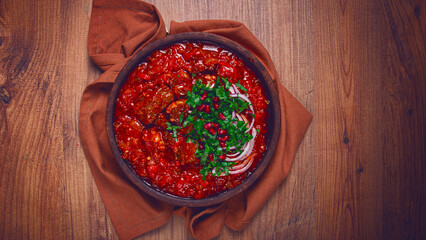 Chashushuli, a traditional Georgian dish, spicy, stewed meat with tomatoes and spices, homemade, no people,