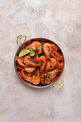 Fried king prawns, in shell, with spices, size 30/40 , unpeeled shrimp,homemade, no people,