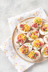Spicy, stuffed ramen eggs, with bacon and green onions, homemade, no people,