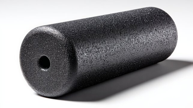 Black foam roller for muscle recovery and fitness exercise