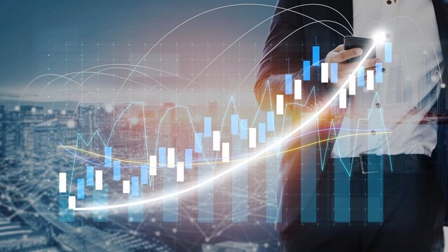 A businessman in a suit holds a smartphone while analyzing stock market trends through dynamic charts and graphs, set against a vibrant cityscape backdrop. Copula