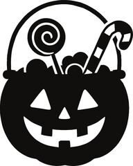 Halloween pumpkin bucket silhouette filled with candies and sweets as festive spooky symbol isolated on white background
