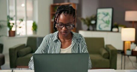 Documents, laptop and remote work with black woman in home office for online planning or research. Computer, paperwork and reading with freelance employee in apartment for small business startup - Powered by Adobe