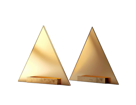 Two triangular, gold-toned mirrors, with a light beige stone base, positioned side-by-side