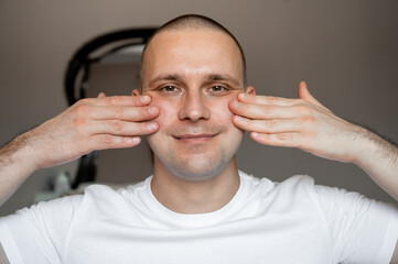 Fototapeta premium Man Skincare – Face Massage at Home