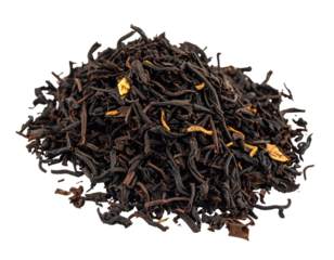 A heap of loose black tea, dark brown and black leaf fragments, with flecks of light orange/yellow