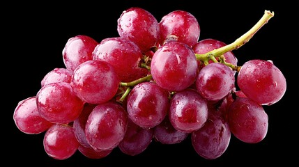 Fresh red grapes cluster on black background with water droplets