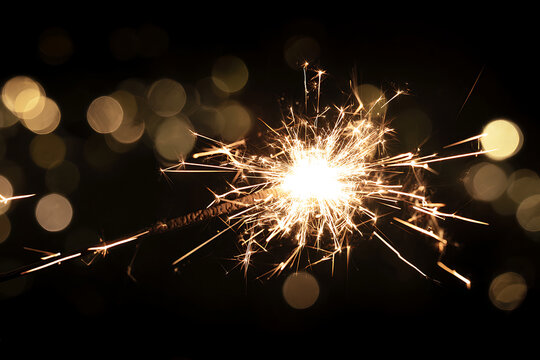 sparkler on a black background - Powered by Adobe