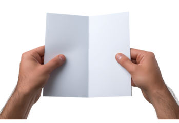 Hands holding blank white folded paper isolated on a transparent background