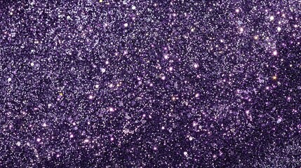 Close up macro shot of sparkling deep purple glitter texture with shimmering highlights and a festive celebratory feel