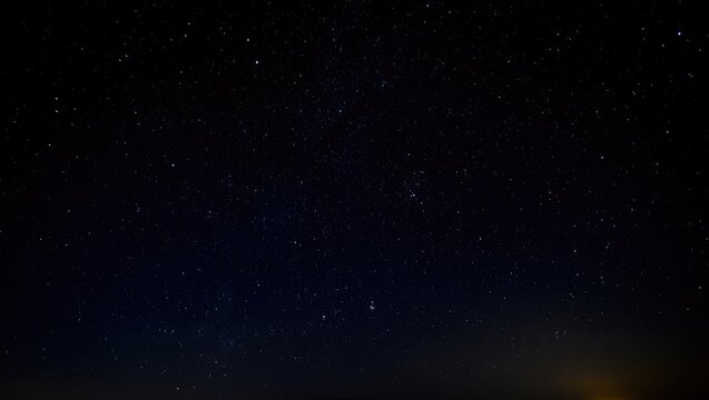 Starry Night Sky with Distant Lights stars cosmos - Powered by Adobe