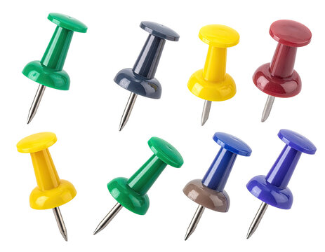 Assorted colored push pins, isolated on black