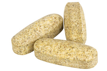 Garlic supplement pills on white background