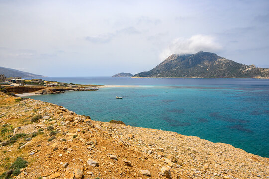 Nikouria, a small uninhabited islet located in front of Aegiali Bay. Amorgos island. Cyclades, Greece