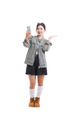 Selfie Moment: A cheerful woman is captured in the midst of taking a selfie with her smartphone. Her expression and pose reflect a sense of spontaneity and joy. 