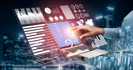 A hand interacts with a digital laptop interface showcasing data visualizations and graphs, set against a vibrant urban landscape, symbolizing modern technology and analysis. Impute