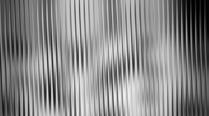 Obraz premium Monochrome abstract background with vertical wavy lines in gray tones