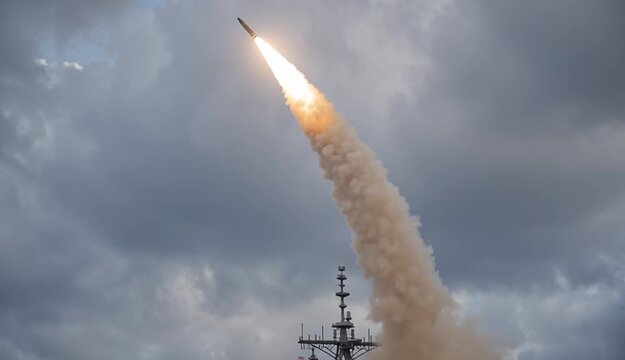 Gray naval frigate launching surface-to-air missile with bright orange flame and gray smoke trail, modern warship on calm ocean waters during weapons test, missile visible in flight trajectory above