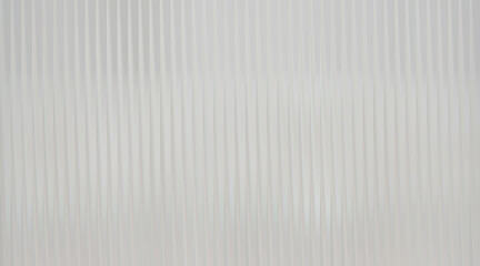 Obraz premium Subtle vertical ribbed texture on white background