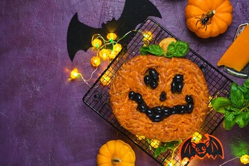 A step-by-step guide to making pumpkin bread shaped like a Halloween jack-o-lantern.