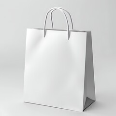 Plain white shopping bag with handles on neutral background