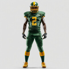 American football player in green and yellow uniform standing upright on isolated background