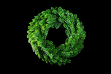 Fir wreath isolated on black background. Decorative element for holiday design.