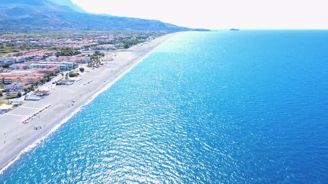 Beautiful Aerial View of a Sunny Beach and Calm Blue Sea in Crete, Greece During the Summer. Italy, Calabria, Santa Maria del Cedro