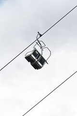 ski lift chair, abandoned without snow, old useless lift chair no more need because of climate change