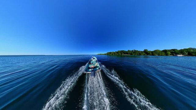 Fishermen on vacation, boating in lake Manitou, Manitoulin Island, Ontario, Canada. End of fishing game tournament. Water sport at fall. Power sport fishing and watersport.