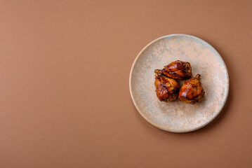 Fried chicken legs with teriyaki sauce, oven baked meat. Chicken legs