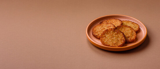 Potato hash browns, a cooked vegetable breakfast food. Potato hash brown