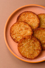 Potato hash browns, a cooked vegetable breakfast food. Potato hash brown