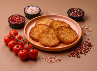 Potato hash browns, a cooked vegetable breakfast food. Potato hash brown