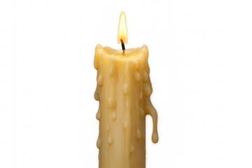 Burning candle flame glowing with melting wax drips