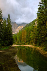 Lake Braies-Neboli-Pragser Wildsee is a lake in the Italian region of South Tyrol, one of the most beautiful lakes in the Dolomites. Italy. Tourism concept.
