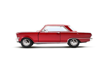 Obraz premium Full left side view of a red colored muscle model toy car photographed on a transparent background.
