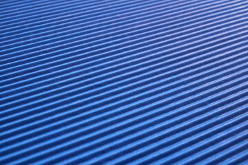 Background and texture, striped blue cardboard, diagonal lines