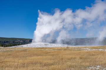Old Faithful is a cone geyser in Yellowstone National Park in Wyoming, United States. Hydrothermal System. The Yellowstone Caldera / Yellowstone Plateau Volcanic Field. Yellowstone hotspot. 