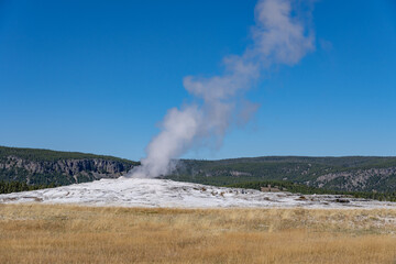 Old Faithful is a cone geyser in Yellowstone National Park in Wyoming, United States. Hydrothermal System. The Yellowstone Caldera / Yellowstone Plateau Volcanic Field. Yellowstone hotspot. 